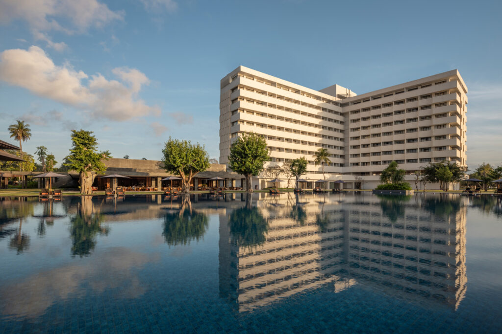 Beachfront resort with infinity pool and ocean views, representing relaxing stays at all-inclusive resorts in Sanur Bali.