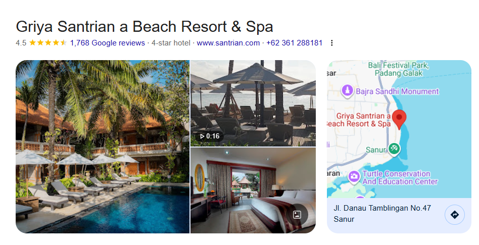 Calm temple setting surrounded by jungle where visitors take part in a traditional Balinese purification ritual in Bali.