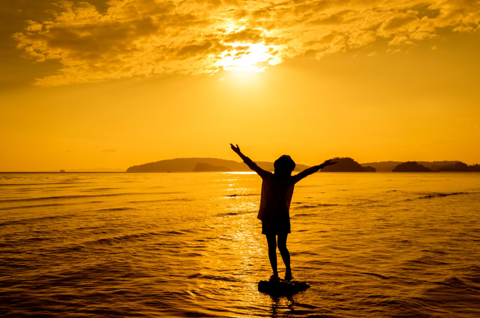 Sanur Beach, Bali: A Tranquil Beachfront Escape for Luxury & Wellness Seekers 12 Romantic sunset walk along the palm-lined shoreline of Sanur Beach Bali.