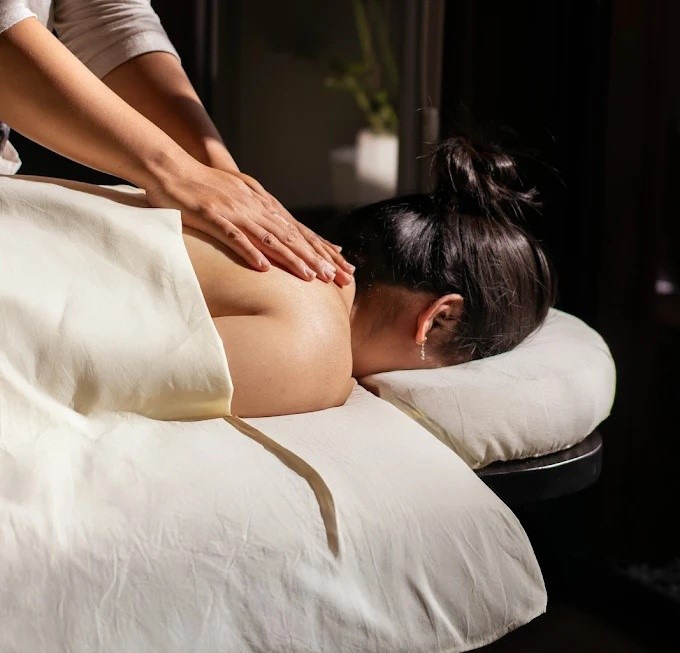 10 Best Wellness Activities in Sanur, Bali in 2026 9 Traditional Balinese massage in an open-air spa pavilion, representing relaxing wellness activities in Sanur Bali.