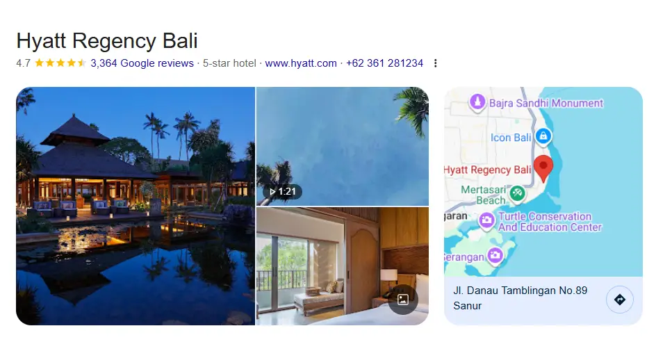 Beachfront view at one of the best family resorts in Sanur Bali with kids enjoying the pool