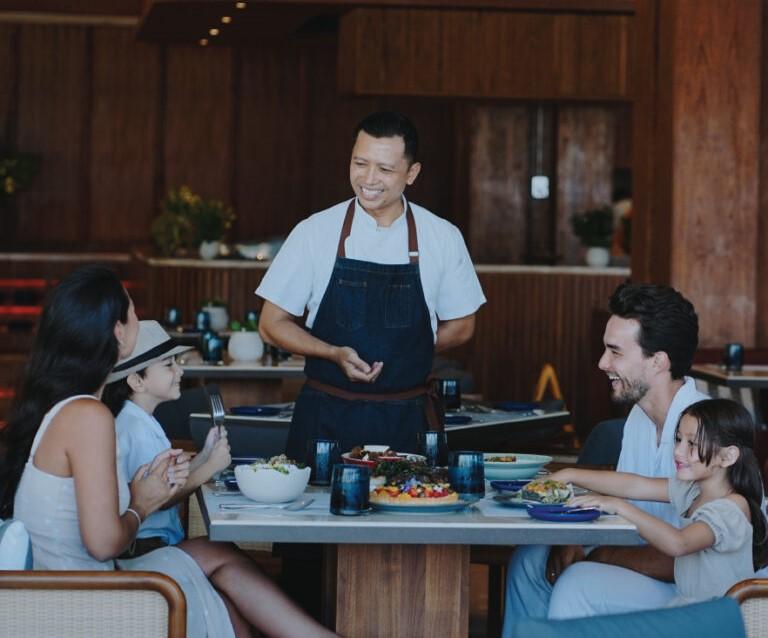 Travelers enjoying tropical brunch at breakfast restaurants in Sanur Bali