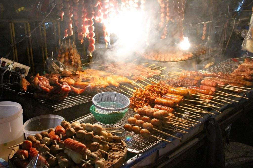 Travelers exploring the vibrant night market in Sanur Bali