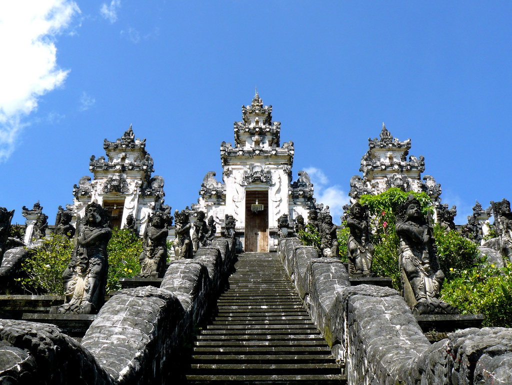 Besakih Temple on the slopes of Mount Agung, featuring traditional Balinese architecture and dramatic mountain views.