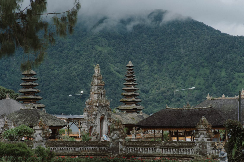 Besakih Temple on the slopes of Mount Agung, featuring traditional Balinese architecture and dramatic mountain views.