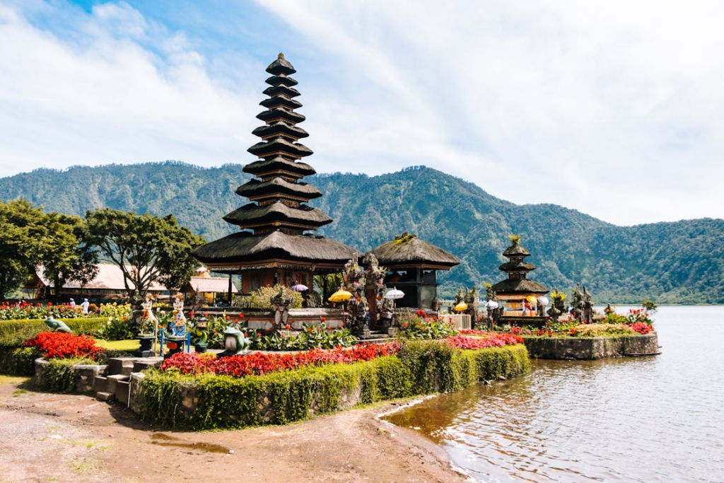 7 Best Temples in Sanur and Denpasar, Bali (2026 Guide) 4 Visitors exploring the Sacred Spiritual Heritage of the East Coast at historic temples overlooking Bali’s coastline.