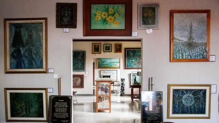 Inside Bali's Fingerprint Painting Museum (2026 Review) 8 Interior of the Fingerprint Painting Museum in Bali, displaying colorful artworks created using unique fingerprint painting techniques.