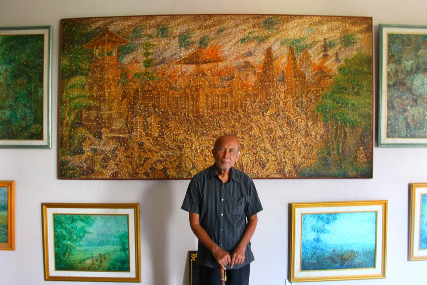Inside Bali's Fingerprint Painting Museum (2026 Review) 9 Visitors viewing exhibits at the Fingerprint Painting Museum, featuring intricate fingerprint-based portraits and artistic creations.
