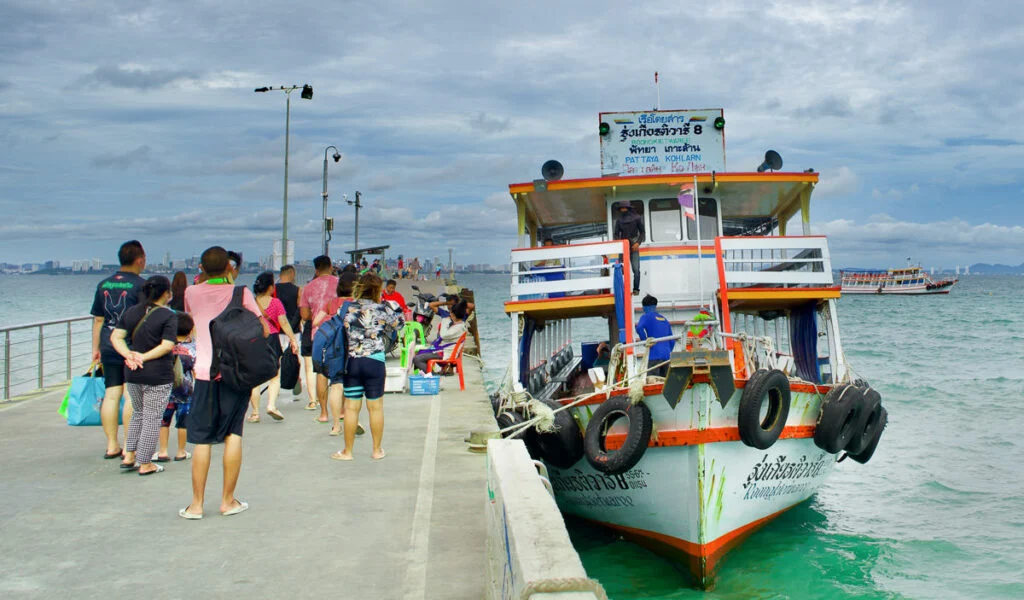 Travelers boarding a ferry from Sanur to Nusa Penida for a day trip adventure.